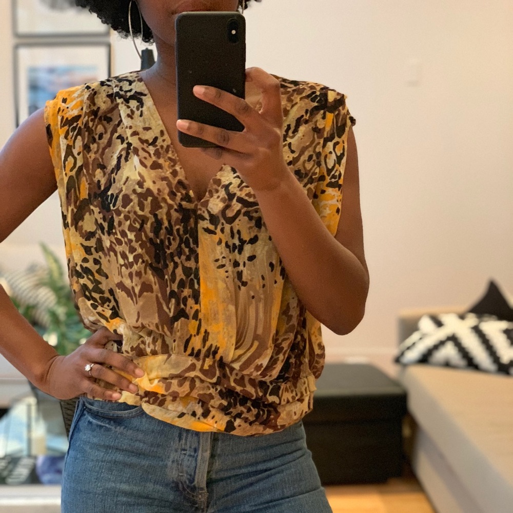 100% Silk Animal print blouse with drop back